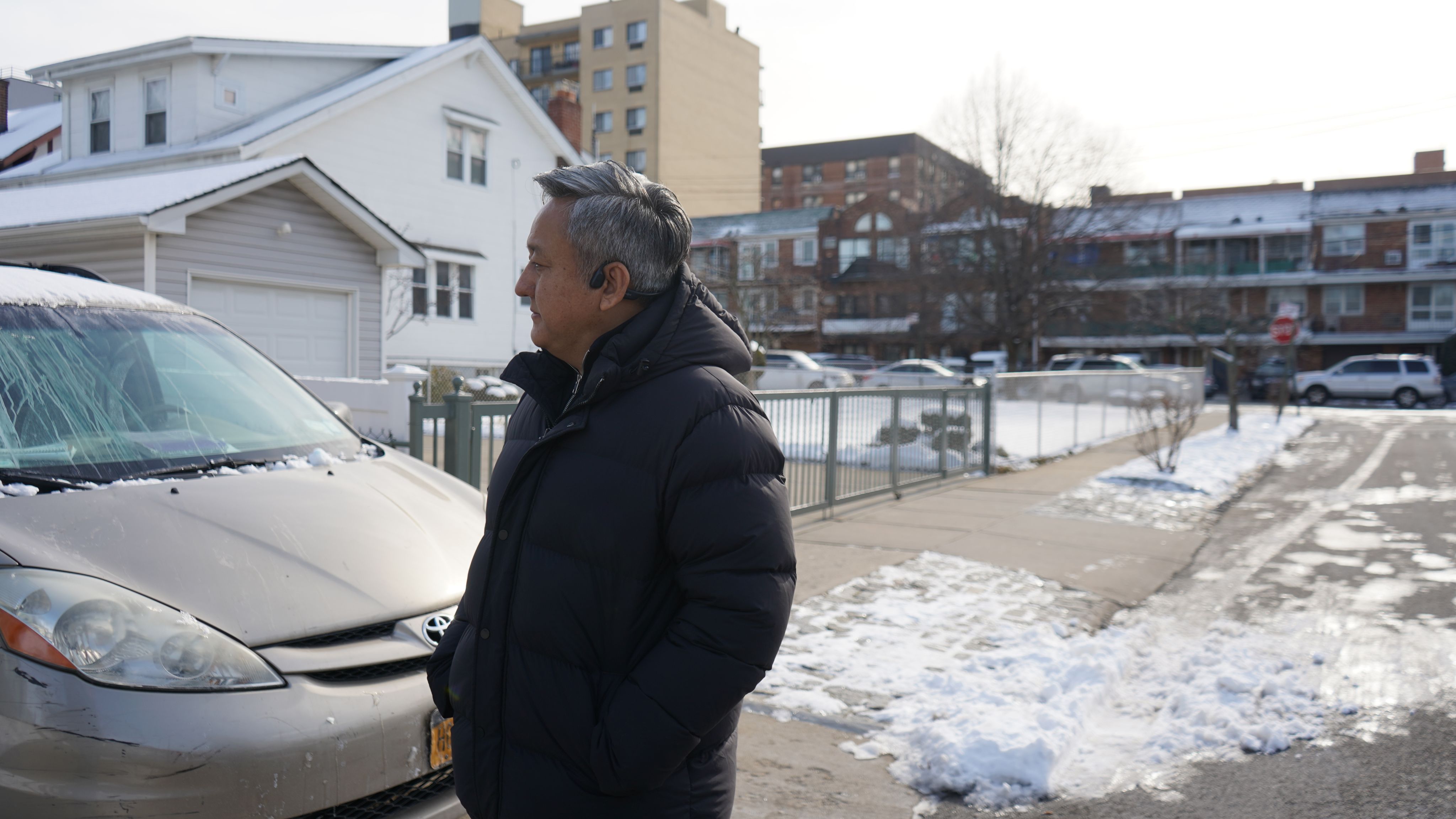 Ma Ju standing outside of a shelter in Flushing, New York, which he set up to assist refugees — many of them survivors of Xinjiang’s re-education camps — as they rebuild their lives in the U.S.