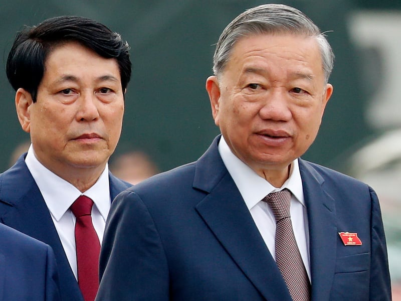 Vietnam's President Luong Cuong, left, and General Secretary of the Communist Party To Lam, walk to the National Assembly in Hanoi, Vietnam, Oct. 21, 2024.